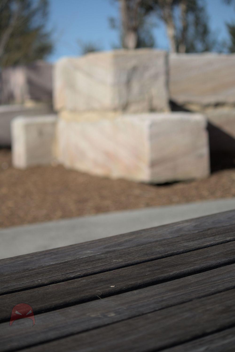 Stone and wood in focus