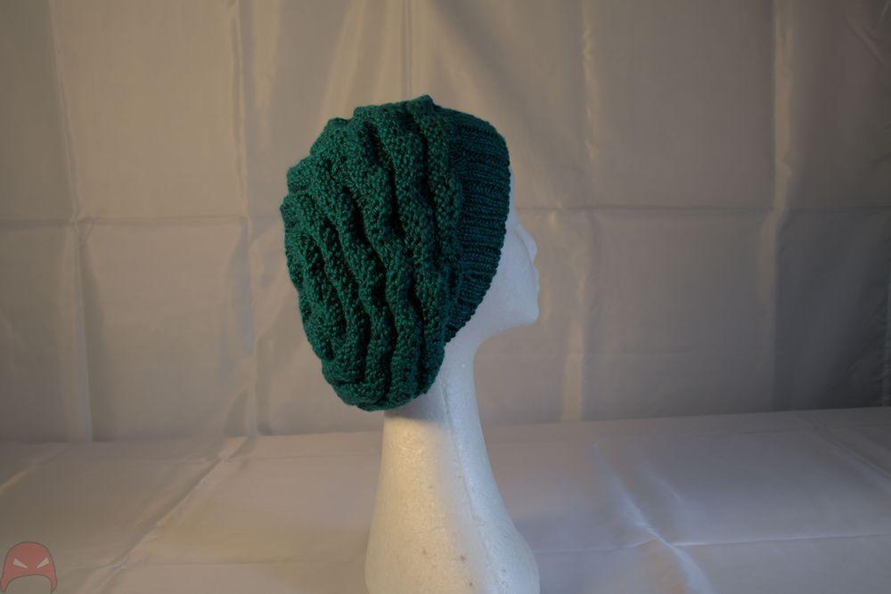 A lustrious green beanie